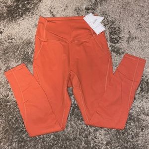Orange BuffBunny leggings M
